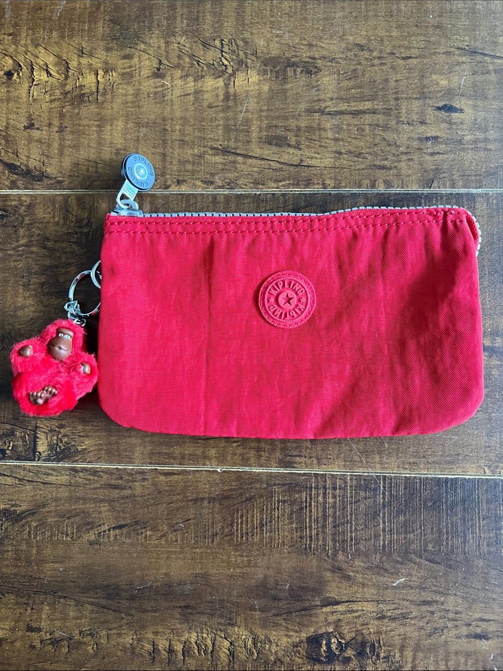 Kipling Bright Red Zip Pouch with Monkey Charm